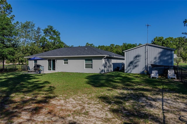 9085 SW 202nd Avenue Rd, Dunnellon, FL 34431 - rear view of house with stucco siding