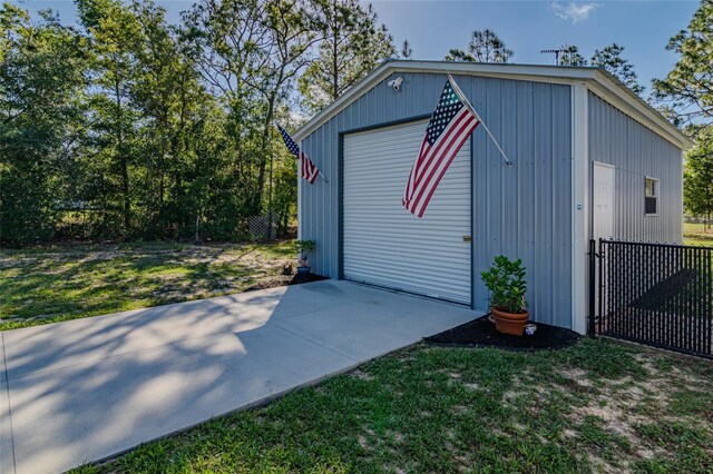 9085 SW 202nd Avenue Rd, Dunnellon, FL 34431 - view of outdoor structure featuring an outbuilding and fence