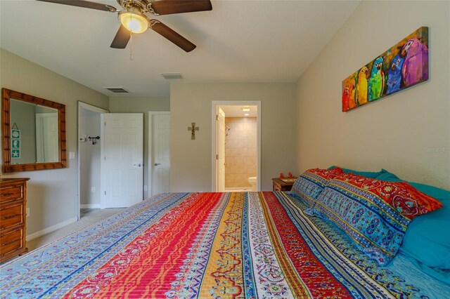 9085 SW 202nd Avenue Rd, Dunnellon, FL 34431 - bedroom featuring ensuite bath, ceiling fan, and baseboards