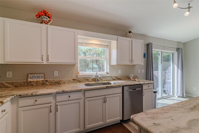 9085 SW 202nd Avenue Rd, Dunnellon, FL 34431 - kitchen featuring dishwasher, a sink, white cabinetry, and dark wood-style floors