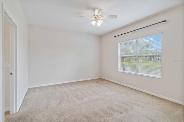 12183 Longview Lake Cir, Bradenton, FL 34211 - carpeted empty room featuring a ceiling fan and baseboards