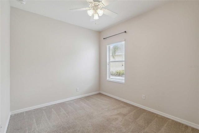 12183 Longview Lake Cir, Bradenton, FL 34211 - spare room featuring light carpet, baseboards, and ceiling fan