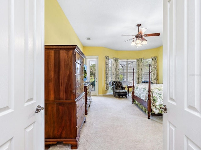 bedroom with light carpet, baseboards, a ceiling fan, and access to exterior