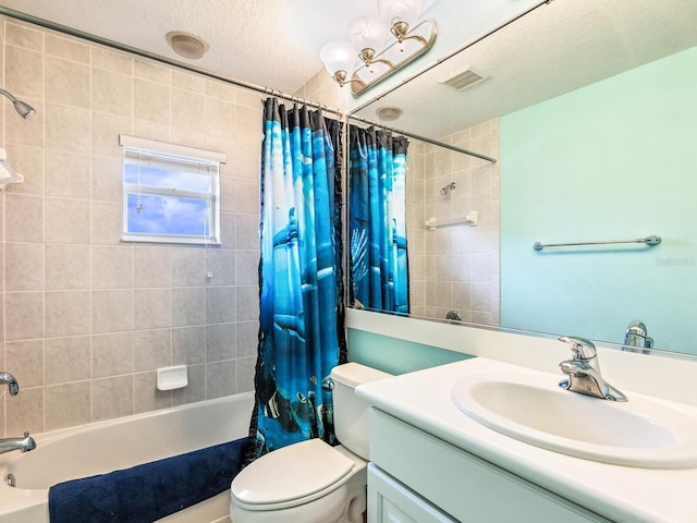 full bathroom featuring shower / bathtub combination with curtain, toilet, vanity, and a textured ceiling
