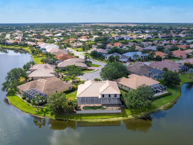 aerial perspective of suburban area featuring a large body of water