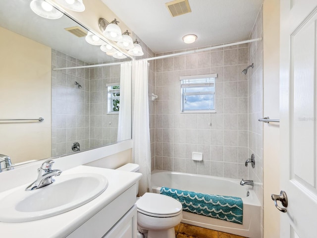 2496 Farms Ct, Sarasota, FL 34240 - bathroom featuring shower / bath combo, toilet, and vanity