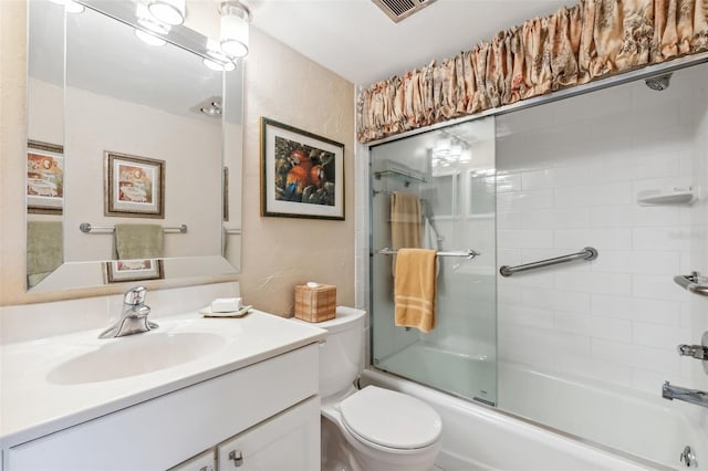 7193 W Country Club Dr N Unit 137, Sarasota, FL 34243 - bathroom with vanity, toilet, and shower / bath combination with glass door