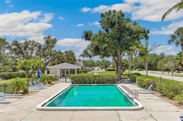 7193 W Country Club Dr N Unit 137, Sarasota, FL 34243 - community pool with a patio and fence