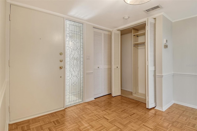 2675 Gulf Of Mexico Dr Unit 404, Longboat Key, FL 34228 - unfurnished bedroom featuring a closet and ornamental molding