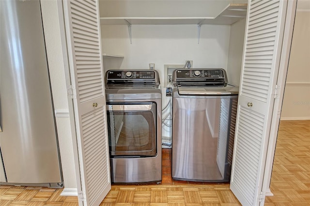 2675 Gulf Of Mexico Dr Unit 404, Longboat Key, FL 34228 - washroom featuring washer and dryer