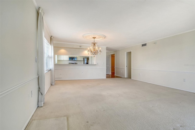 2675 Gulf Of Mexico Dr Unit 404, Longboat Key, FL 34228 - unfurnished living room featuring a chandelier, crown molding, and light carpet