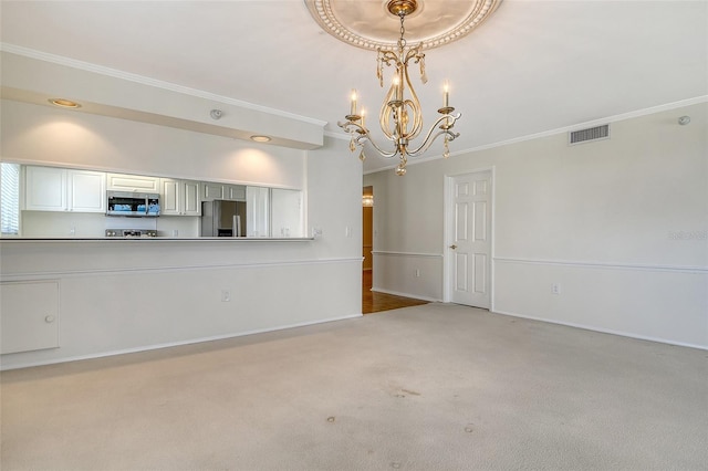2675 Gulf Of Mexico Dr Unit 404, Longboat Key, FL 34228 - unfurnished living room with ornamental molding, a chandelier, and carpet