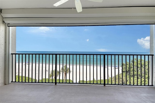 2675 Gulf Of Mexico Dr Unit 404, Longboat Key, FL 34228 - balcony with a ceiling fan and view of water and beach