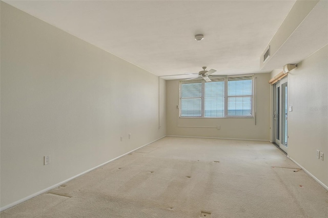 2675 Gulf Of Mexico Dr Unit 404, Longboat Key, FL 34228 - empty room with light carpet, ceiling fan, and a smoke detector