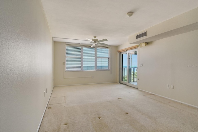 2675 Gulf Of Mexico Dr Unit 404, Longboat Key, FL 34228 - carpeted empty room with ceiling fan and a smoke detector