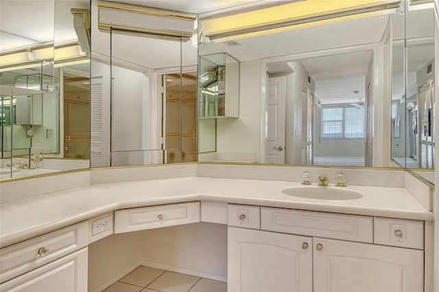 2675 Gulf Of Mexico Dr Unit 404, Longboat Key, FL 34228 - bathroom with tile patterned floors and vanity