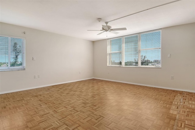 2675 Gulf Of Mexico Dr Unit 404, Longboat Key, FL 34228 - unfurnished room with healthy amount of natural light, ceiling fan, and a smoke detector
