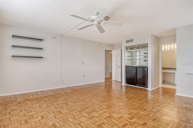 2675 Gulf Of Mexico Dr Unit 404, Longboat Key, FL 34228 - unfurnished bedroom featuring ensuite bathroom and a ceiling fan