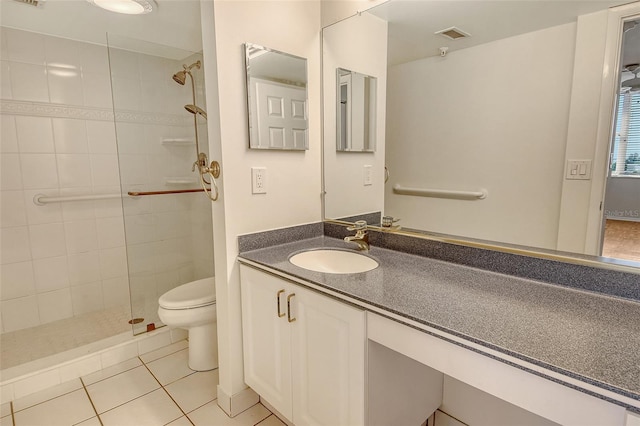 2675 Gulf Of Mexico Dr Unit 404, Longboat Key, FL 34228 - bathroom featuring tiled shower, tile patterned flooring, and vanity