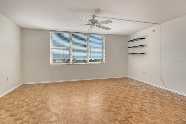 2675 Gulf Of Mexico Dr Unit 404, Longboat Key, FL 34228 - unfurnished room with ceiling fan and a smoke detector