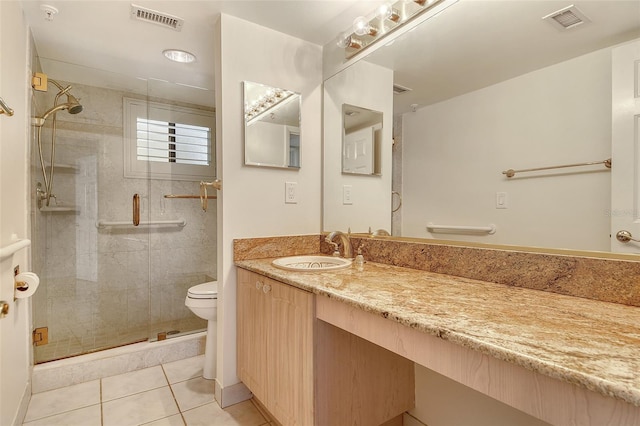 2675 Gulf Of Mexico Dr Unit 404, Longboat Key, FL 34228 - bathroom featuring a stall shower, tile patterned flooring, and vanity