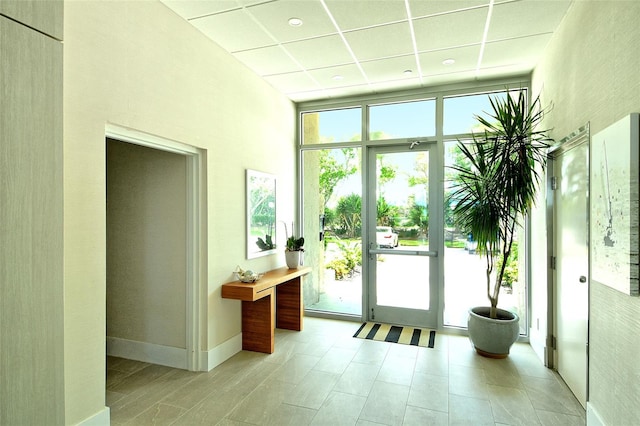 2675 Gulf Of Mexico Dr Unit 404, Longboat Key, FL 34228 - entryway with a paneled ceiling and a towering ceiling