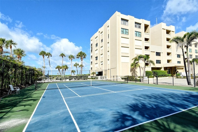 2675 Gulf Of Mexico Dr Unit 404, Longboat Key, FL 34228 - view of tennis court with community basketball court