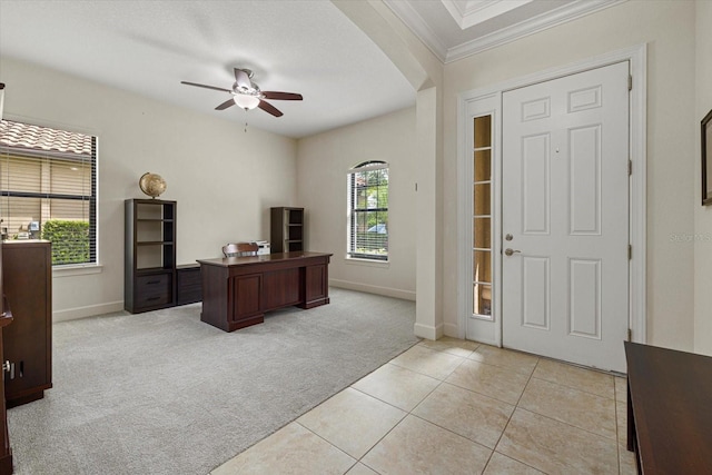 9769 Highland Park Pl, Palmetto, FL 34221 - office featuring crown molding, light colored carpet, a ceiling fan, baseboards, and light tile patterned flooring