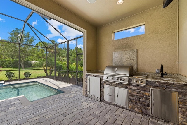 9769 Highland Park Pl, Palmetto, FL 34221 - view of patio with exterior kitchen, a grill, a sink, an outdoor pool, and glass enclosure