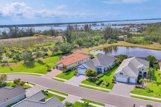 aerial perspective of suburban area with a large body of water