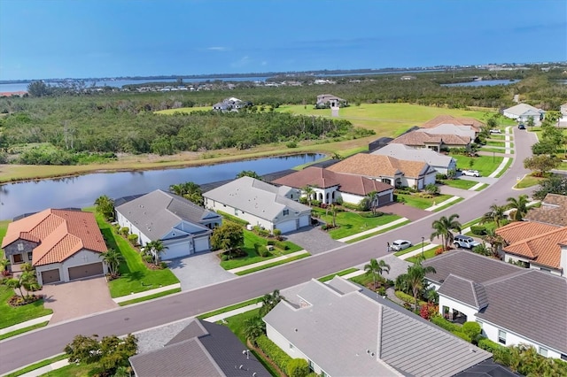 aerial perspective of suburban area featuring a large body of water
