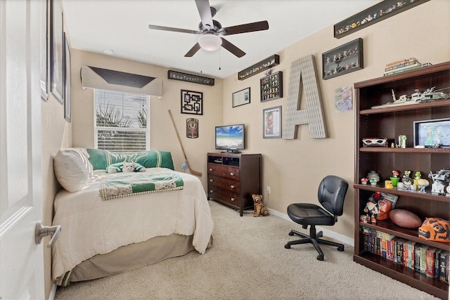 11507 84th Street Cir E Unit 102, Parrish, FL 34219 - bedroom with carpet floors, baseboards, and a ceiling fan