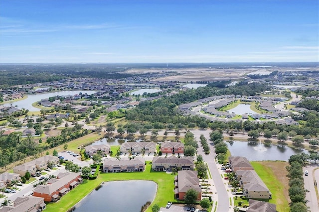 11507 84th Street Cir E Unit 102, Parrish, FL 34219 - aerial overview of property's location featuring a large body of water and nearby suburban area