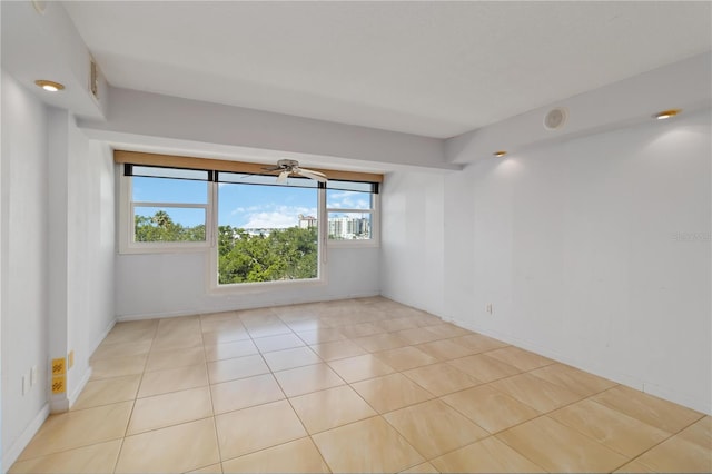 33 S Gulfstream Ave Unit 502, Sarasota, FL 34236 - spare room featuring tile patterned floors and baseboards