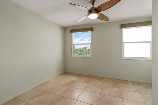 33 S Gulfstream Ave Unit 502, Sarasota, FL 34236 - spare room with a ceiling fan, light tile patterned floors, and a textured ceiling