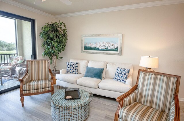 7005 River Hammock Dr Unit 204, Bradenton, FL 34212 - living room with wood finished floors, ornamental molding, and ceiling fan