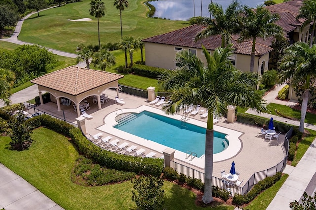 7005 River Hammock Dr Unit 204, Bradenton, FL 34212 - community pool featuring a gazebo, a patio, and view of golf course