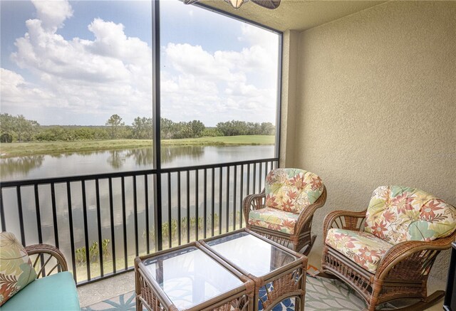 7005 River Hammock Dr Unit 204, Bradenton, FL 34212 - sunroom / solarium featuring a water view and plenty of natural light
