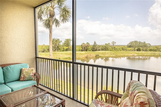 7005 River Hammock Dr Unit 204, Bradenton, FL 34212 - sunroom / solarium with a water view