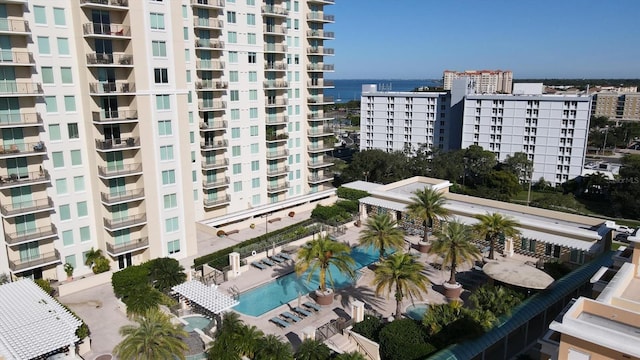 view of apartment building / complex featuring a water view