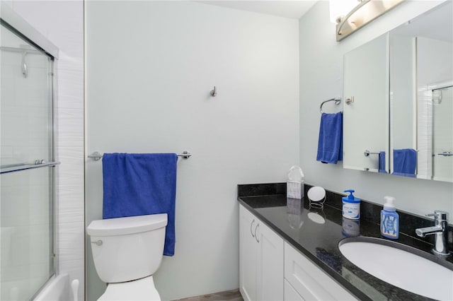 6999 W Country Club Dr N Unit 224, Sarasota, FL 34243 - bathroom with an enclosed shower, vanity, and toilet
