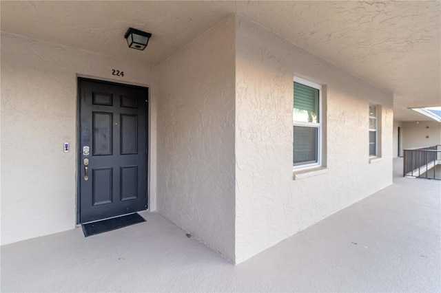6999 W Country Club Dr N Unit 224, Sarasota, FL 34243 - entrance to property with stucco siding