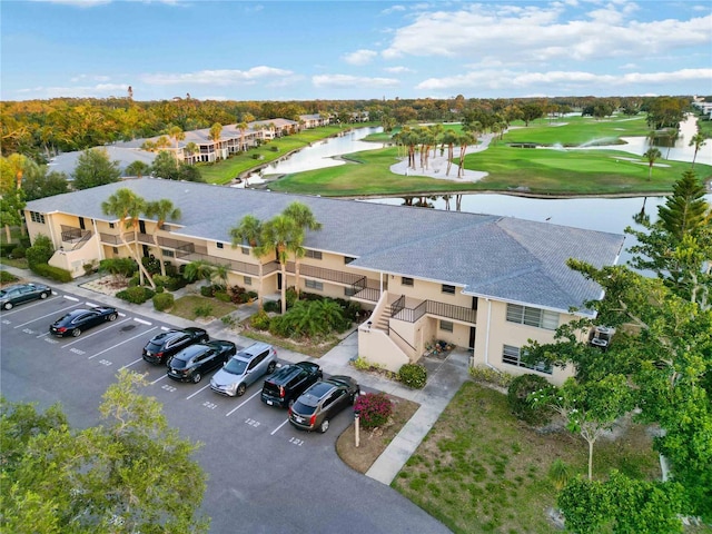 6999 W Country Club Dr N Unit 224, Sarasota, FL 34243 - drone / aerial view of a golf course and a large body of water