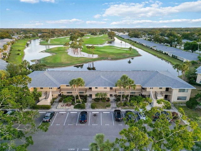 6999 W Country Club Dr N Unit 224, Sarasota, FL 34243 - drone / aerial view of a golf club and a nearby body of water