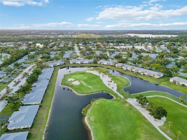 6999 W Country Club Dr N Unit 224, Sarasota, FL 34243 - aerial view of property and surrounding area with a large body of water, nearby suburban area, and a golf course