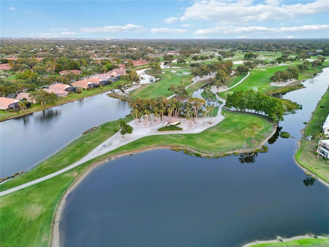 6999 W Country Club Dr N Unit 224, Sarasota, FL 34243 - aerial view of property and surrounding area featuring nearby suburban area, a nearby body of water, and a golf course