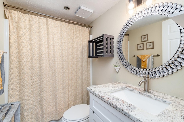 104 Capri Isles Blvd Unit 207, Venice, FL 34292 - bathroom with toilet and vanity