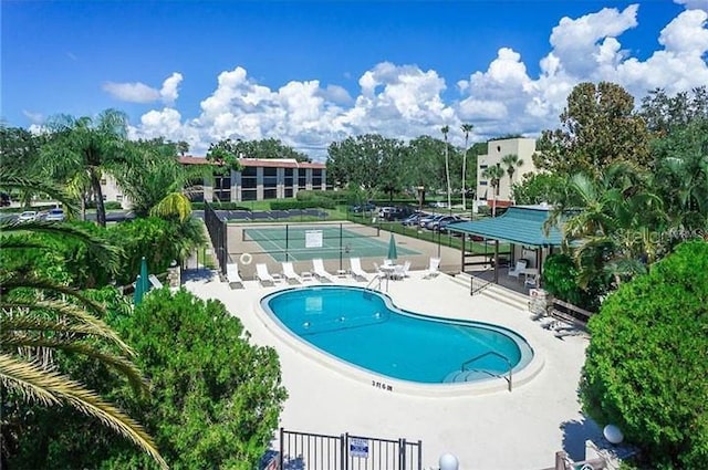104 Capri Isles Blvd Unit 207, Venice, FL 34292 - community pool featuring a patio area