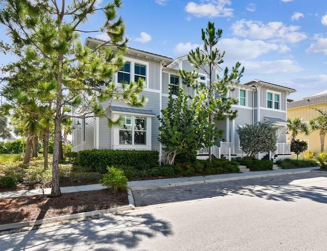 311 Compass Point Dr Unit 101, Bradenton, FL 34209 - townhome / multi-family property with board and batten siding