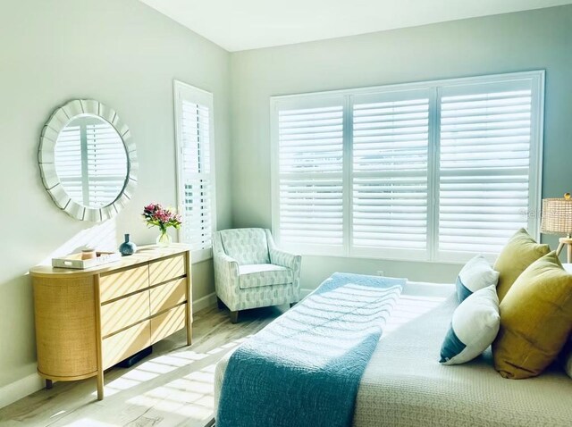 311 Compass Point Dr Unit 101, Bradenton, FL 34209 - bedroom featuring baseboards and light wood-style floors